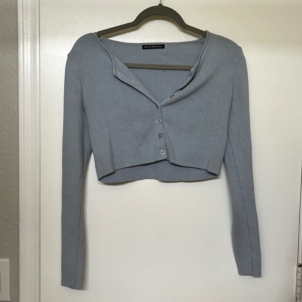 Brandy Melville light blue button cropped sweater, one size, it great condition.